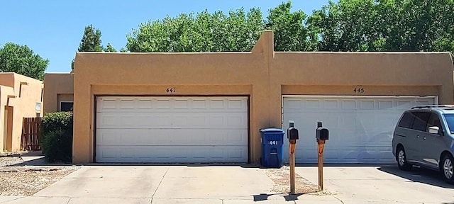 441 Colonial Ave SW, Los Lunas, NM 87031 - garage featuring concrete driveway