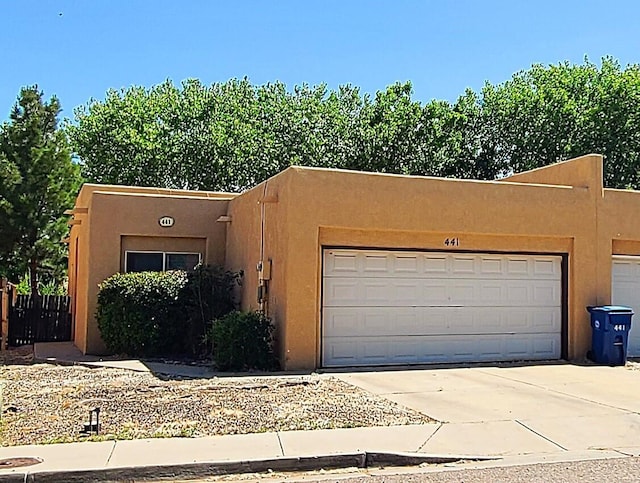 441 Colonial Ave SW, Los Lunas, NM 87031 - garage featuring driveway