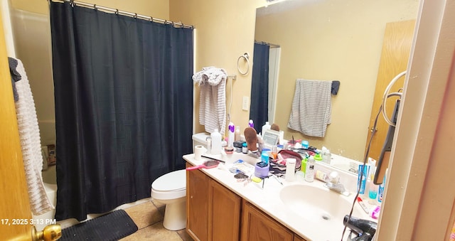 441 Colonial Ave SW, Los Lunas, NM 87031 - full bath with vanity, shower / tub combo, and tile patterned flooring