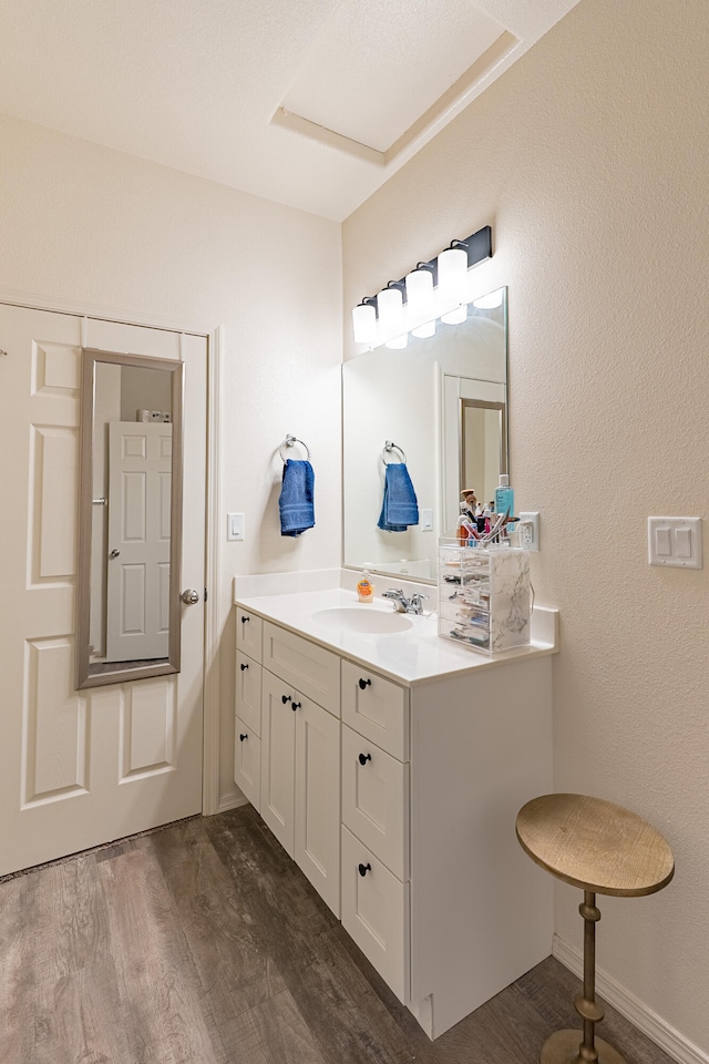 602 Camino Andres, Moriarty, NM 87035 - bathroom featuring vanity and wood finished floors