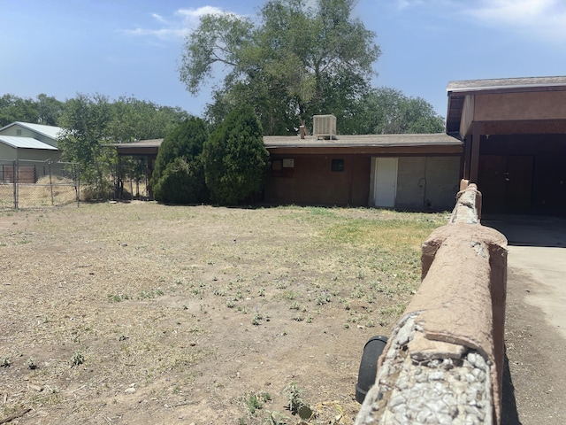 6011 Hubbell Cir SW, Albuquerque, NM 87105 - view of yard with concrete driveway