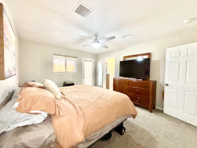 1704 Jack Nicklaus Dr, Rio Communities, NM 87002 - bedroom with light carpet and a ceiling fan