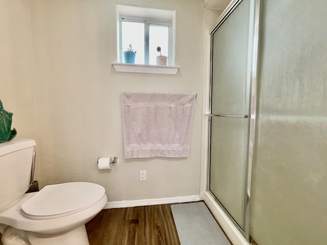 1704 Jack Nicklaus Dr, Rio Communities, NM 87002 - full bathroom featuring a shower with shower door and wood finished floors