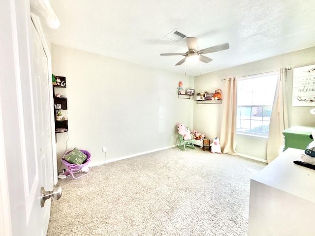 1704 Jack Nicklaus Dr, Rio Communities, NM 87002 - playroom featuring ceiling fan and carpet flooring