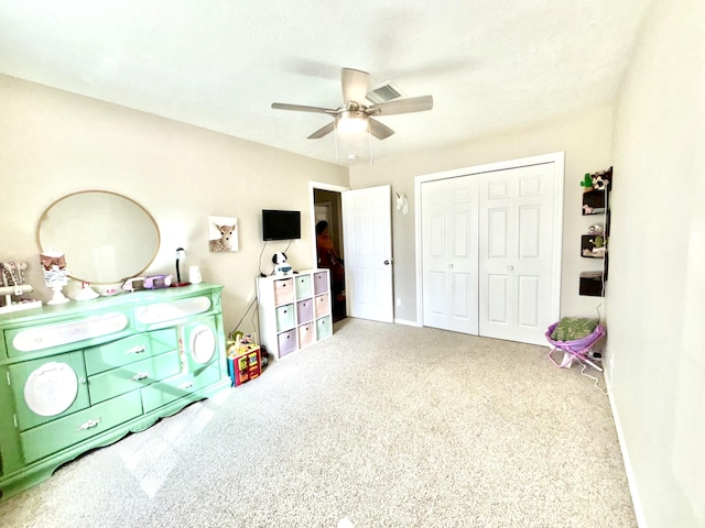 1704 Jack Nicklaus Dr, Rio Communities, NM 87002 - carpeted bedroom featuring a closet and a ceiling fan