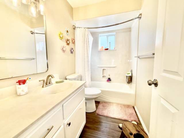 1704 Jack Nicklaus Dr, Rio Communities, NM 87002 - full bath featuring vanity, shower / tub combo with curtain, and wood finished floors