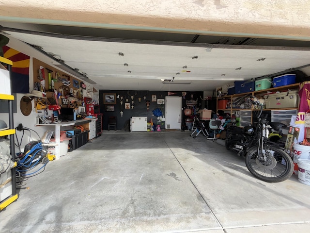 1704 Jack Nicklaus Dr, Rio Communities, NM 87002 - garage featuring a workshop area