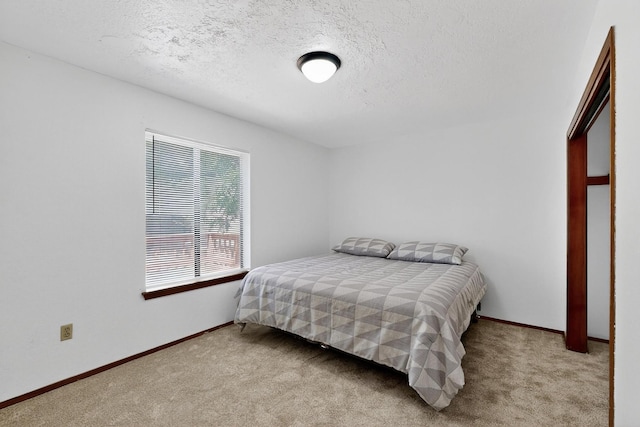 7939 Independence Dr NW, Albuquerque, NM 87120 - bedroom with carpet flooring and a textured ceiling