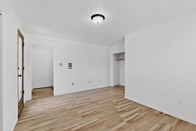 7939 Independence Dr NW, Albuquerque, NM 87120 - unfurnished bedroom featuring light wood finished floors and a closet