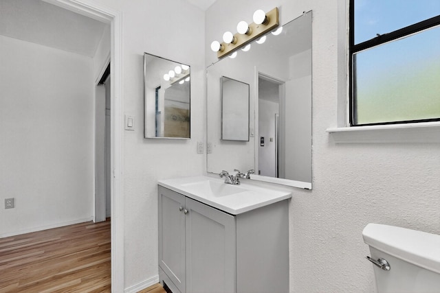 7939 Independence Dr NW, Albuquerque, NM 87120 - bathroom featuring vanity and wood finished floors
