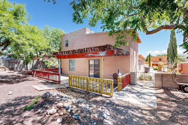 7939 Independence Dr NW, Albuquerque, NM 87120 - rear view of property with stucco siding