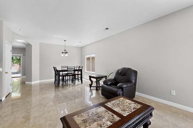 1468 Montiano Loop SE, Rio Rancho, NM 87124 - living area with arched walkways and light marble finish flooring