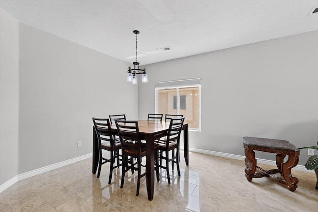 1468 Montiano Loop SE, Rio Rancho, NM 87124 - dining room with a chandelier and baseboards
