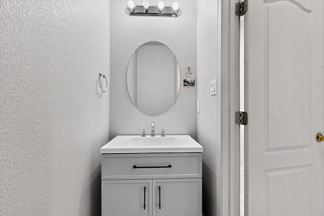 1468 Montiano Loop SE, Rio Rancho, NM 87124 - bathroom with a textured wall and vanity