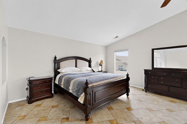 1468 Montiano Loop SE, Rio Rancho, NM 87124 - bedroom with vaulted ceiling, light stone finish floors, arched walkways, and ceiling fan