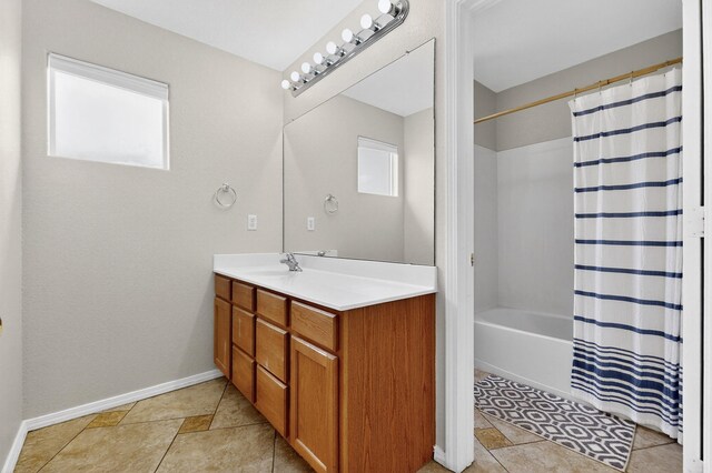 1468 Montiano Loop SE, Rio Rancho, NM 87124 - full bathroom with vanity, shower / bath combo with shower curtain, and tile patterned flooring
