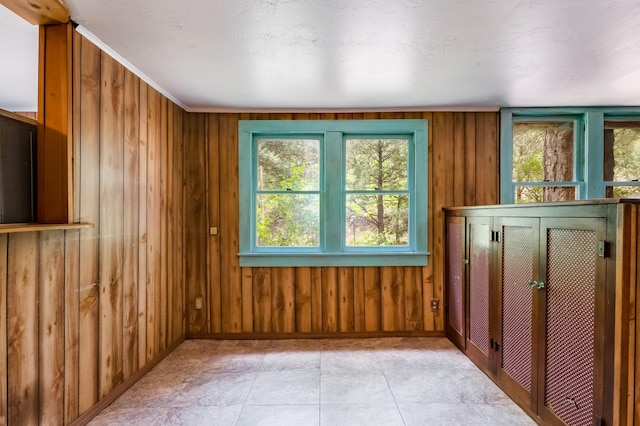 88 Tejano Canyon Rd, Sandia Park, NM 87047 - empty room featuring wooden walls