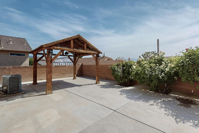 2704 Ghost Ranch St SW, Albuquerque, NM 87121 - fenced backyard with a patio and a gazebo