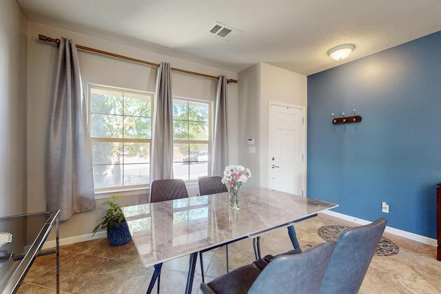 613 Loma Linda Loop NE, Rio Rancho, NM 87124 - dining space with baseboards