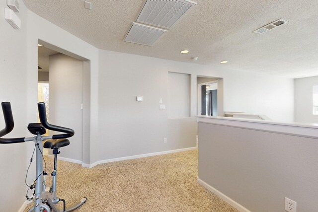 613 Loma Linda Loop NE, Rio Rancho, NM 87124 - workout area with carpet floors, a textured ceiling, and recessed lighting