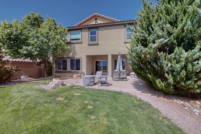613 Loma Linda Loop NE, Rio Rancho, NM 87124 - back of house featuring stucco siding, a patio, and a tile roof
