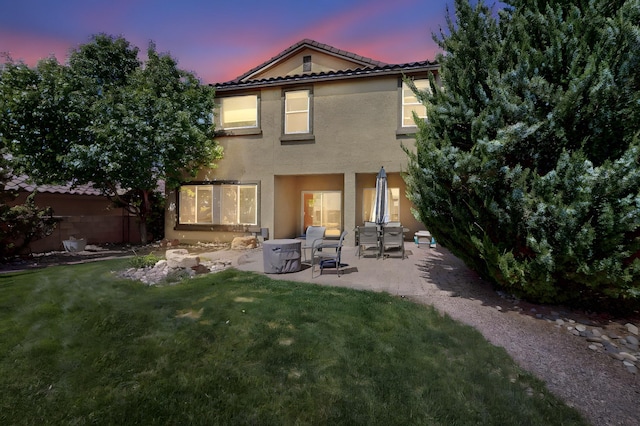 613 Loma Linda Loop NE, Rio Rancho, NM 87124 - rear view of property with a patio area, stucco siding, and a tiled roof