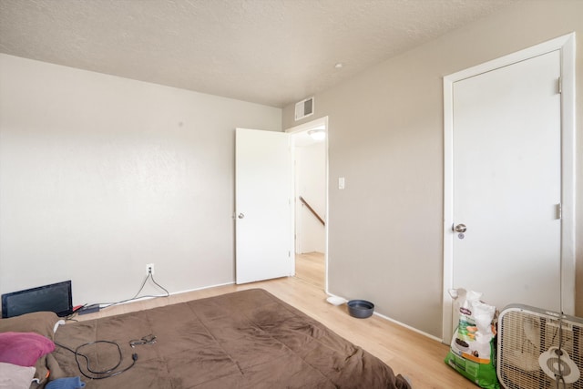 9200 Lagrima De Oro Rd NE, Albuquerque, NM 87111 - bedroom with wood finished floors