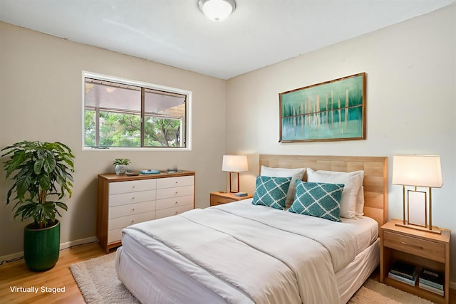 9200 Lagrima De Oro Rd NE, Albuquerque, NM 87111 - bedroom with wood finished floors and baseboards