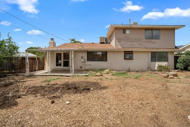 9200 Lagrima De Oro Rd NE, Albuquerque, NM 87111 - rear view of house with a patio and stucco siding