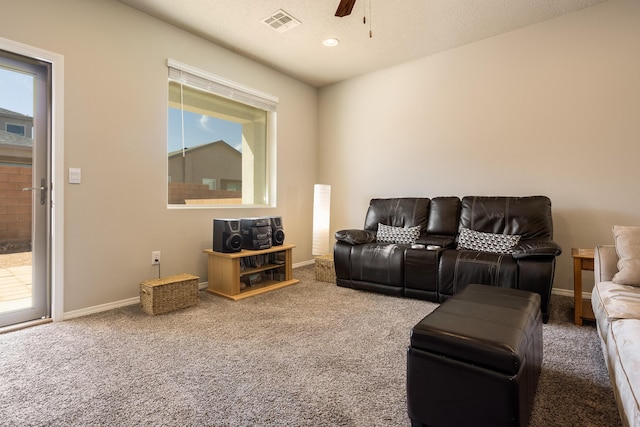 4880 Blackburn Rd, Rio Rancho, NM 87144 - carpeted living room with a ceiling fan and baseboards
