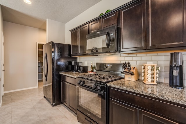 4880 Blackburn Rd, Rio Rancho, NM 87144 - kitchen featuring black appliances, light stone countertops, decorative backsplash, dark brown cabinets, and a textured ceiling