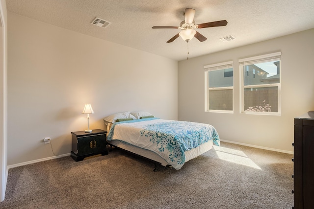 4880 Blackburn Rd, Rio Rancho, NM 87144 - bedroom with carpet flooring, a textured ceiling, and a ceiling fan