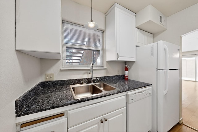 1821 Dartmouth Dr NE Unit 104, Albuquerque, NM 87106 - kitchen with white dishwasher, white cabinetry, and pendant lighting