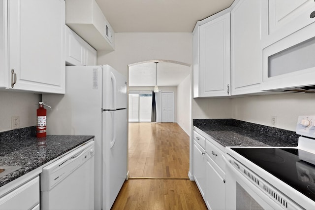 1821 Dartmouth Dr NE Unit 104, Albuquerque, NM 87106 - kitchen with white appliances, white cabinetry, and light wood-style floors