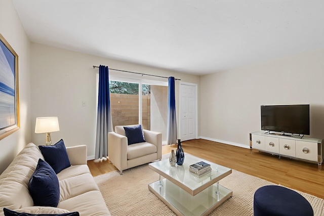 1821 Dartmouth Dr NE Unit 104, Albuquerque, NM 87106 - living room featuring wood finished floors