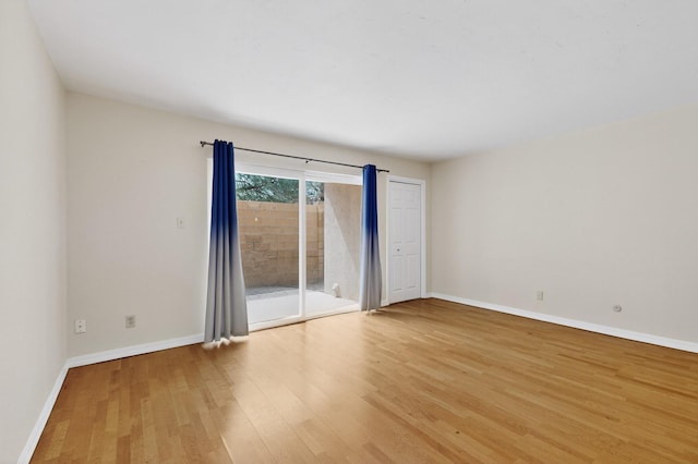 1821 Dartmouth Dr NE Unit 104, Albuquerque, NM 87106 - empty room featuring light wood finished floors and baseboards