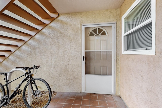 1821 Dartmouth Dr NE Unit 104, Albuquerque, NM 87106 - view of exterior entry with stucco siding