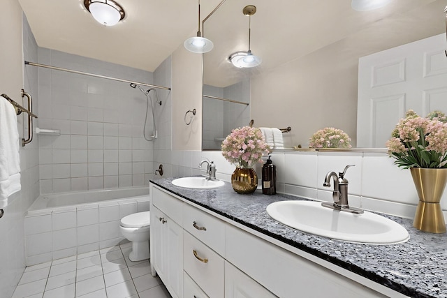 1821 Dartmouth Dr NE Unit 104, Albuquerque, NM 87106 - bathroom featuring tile patterned floors, tiled shower / bath combo, and double vanity
