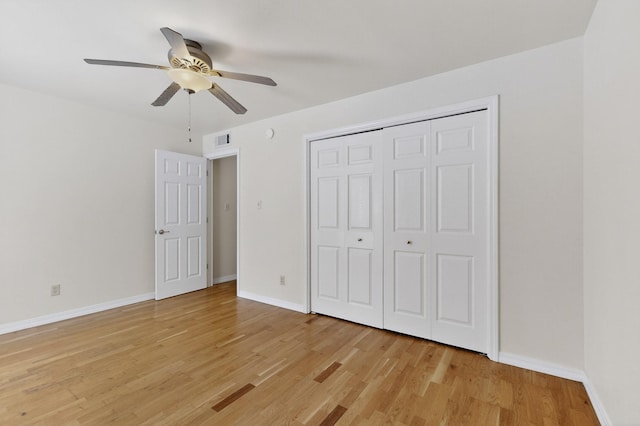 1821 Dartmouth Dr NE Unit 104, Albuquerque, NM 87106 - unfurnished bedroom with light wood-type flooring, a ceiling fan, and a closet