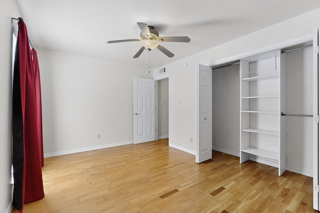 1821 Dartmouth Dr NE Unit 104, Albuquerque, NM 87106 - unfurnished bedroom featuring light wood-type flooring and ceiling fan