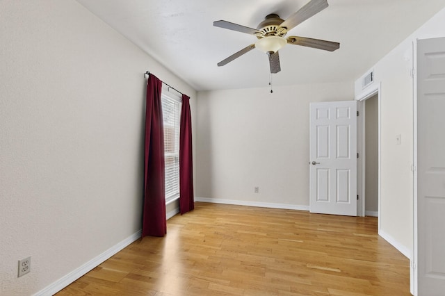 1821 Dartmouth Dr NE Unit 104, Albuquerque, NM 87106 - unfurnished room with light wood-style flooring and ceiling fan