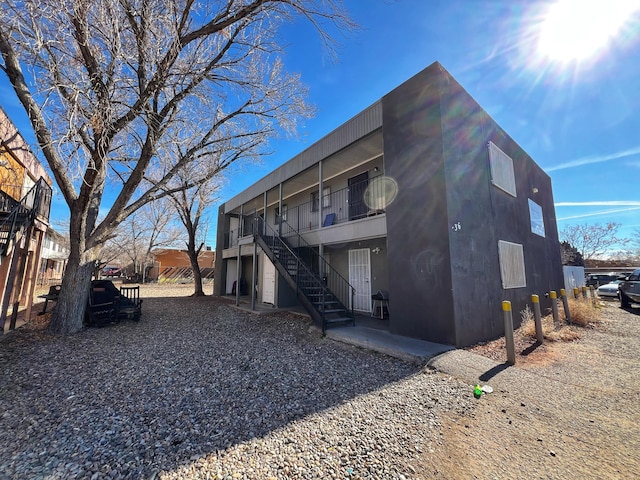 136 General Arnold St NE, Albuquerque, NM 87123 - back of property featuring stairs
