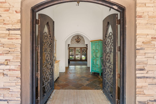 746 Chamisal Rd NW, Los Ranchos, NM 87107 - doorway to property with french doors