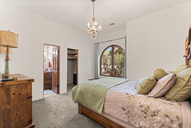 746 Chamisal Rd NW, Los Ranchos, NM 87107 - carpeted bedroom with a chandelier and a walk in closet