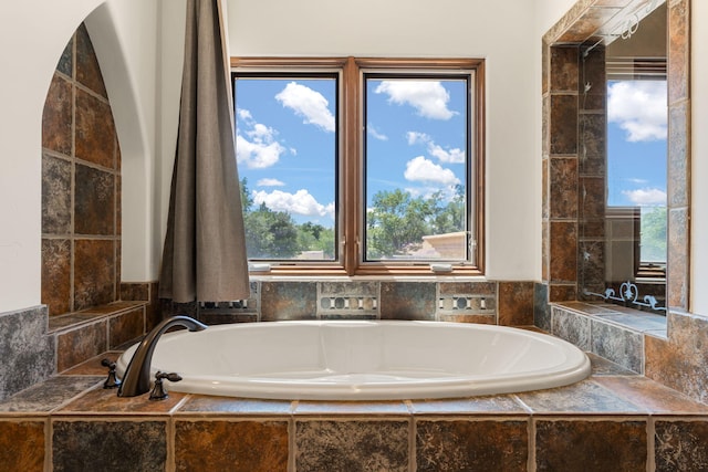 746 Chamisal Rd NW, Los Ranchos, NM 87107 - full bath with a bath and healthy amount of natural light