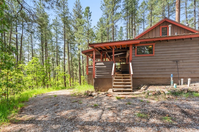 578 Horseshoe Loop, Jemez Springs, NM 87025 - exterior space with board and batten siding