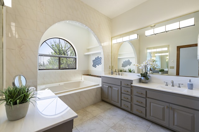 8712 Greenarbor Rd NE, Albuquerque, NM 87122 - full bath featuring double vanity, a bath, and tile patterned flooring