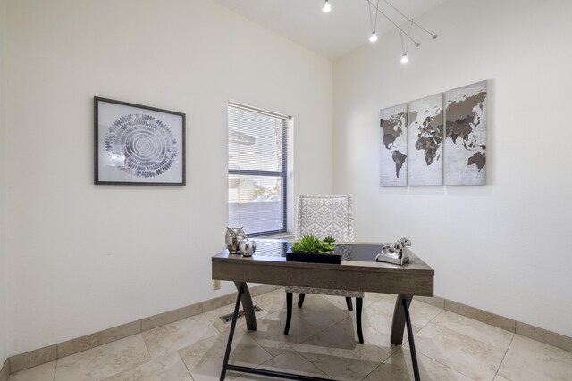 8712 Greenarbor Rd NE, Albuquerque, NM 87122 - home office featuring light tile patterned floors and baseboards