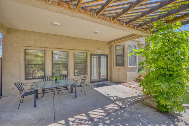 8712 Greenarbor Rd NE, Albuquerque, NM 87122 - view of patio / terrace with a pergola and outdoor dining space