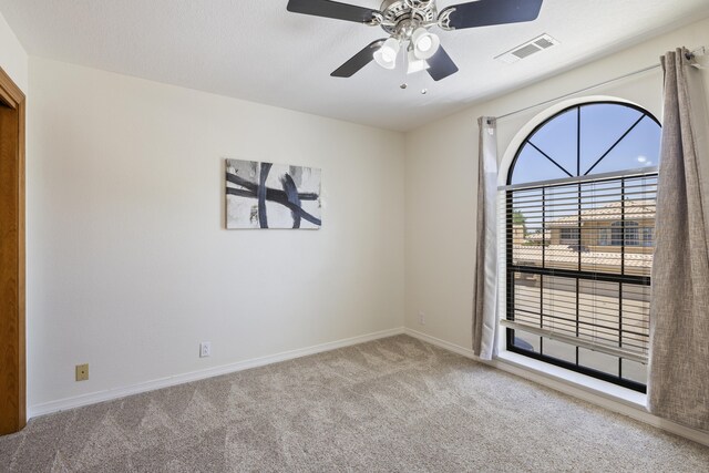8712 Greenarbor Rd NE, Albuquerque, NM 87122 - empty room featuring carpet floors and a ceiling fan